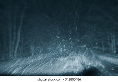 Snowstorm On A Country Road At Night, View From A Car, Natural Photography