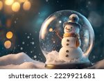 A snowstorm is present while a snowman is depicted in a glass Christmas globe.
The background is an exquisite bokeh. 