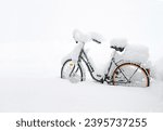 snowy bicycle, after an overnight blizzard everything was deeply covered in snow