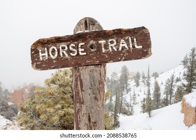 Snowy Bryce Canyon Behind Horse Trail Sign On Overcast Day