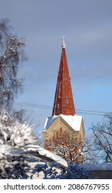 Snowy City Scene With Snow On The Streets And Trees