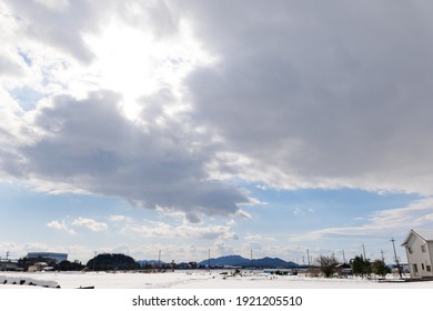 A Snowy City Scene In Winter In Japan