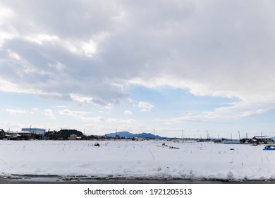 A Snowy City Scene In Winter In Japan