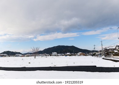 A Snowy City Scene In Winter In Japan