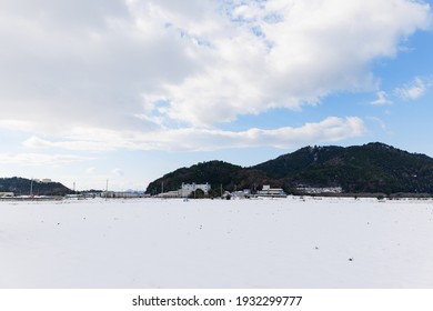 A Snowy City Scene In Winter In Japan