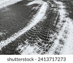 snowy cobblestone pavement, cleared from snow after snowfall.