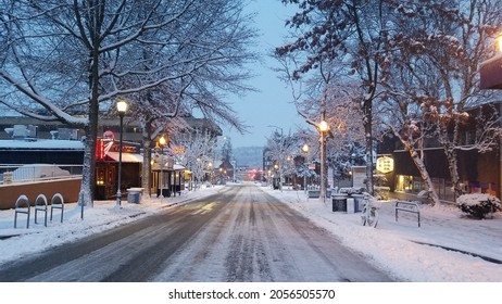 snowy day of empty street in the University district in Seattle.  - Powered by Shutterstock