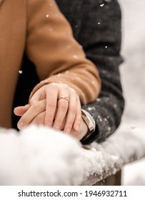 Snowy Engagement Photos In Beautiful Slovenia Featuring A Young Couple. 