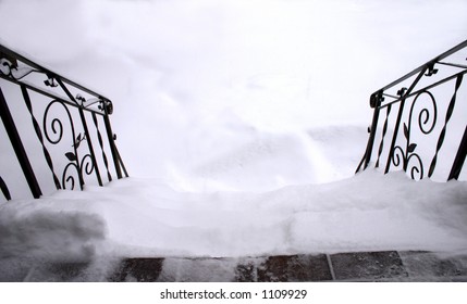 Snowy Front Steps With Railing