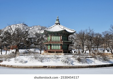 Snowy Garden with a Traditional Asian Pagoda - Powered by Shutterstock