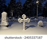 snowy graveyard in Kempele, Finland