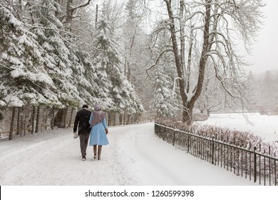 Snowy Lovers View From The Back, Loving Couple In Winter Under Christmas