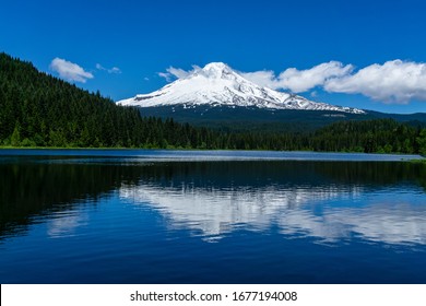 Snowy Mount Hood southern slope with reflection on Trillium Lake, Government Camp, Mt Hood National Forest, Oregon.