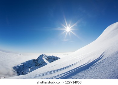 Snowy Mountain Landscape In A Winter Clear Day. Western Alps, Piemonte, Italy.