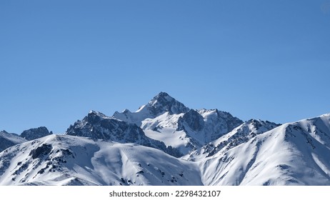 snowy mountain peaks. snow cliffs. the icy desert. snowy expanses - Powered by Shutterstock