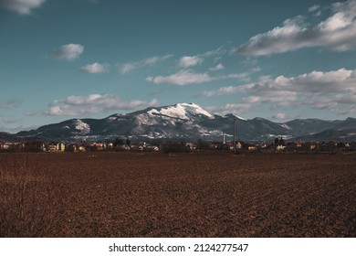 Snowy Mountain Top With Empty Crop Fields