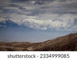 snowy mountains of peru from hight point of view