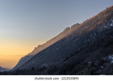 The Snowy Mountains In Utah In Little Cottonwood Canyon During Sunset