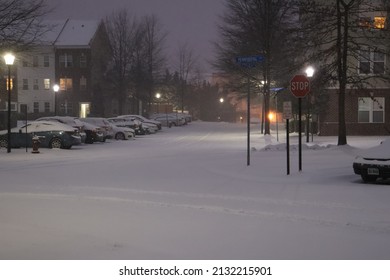 Snowy Neighborhood Street During Snow Storm At Night