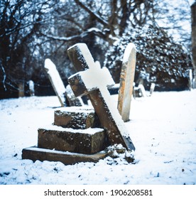 Snowy Old Grave Stone Cross Shaped 