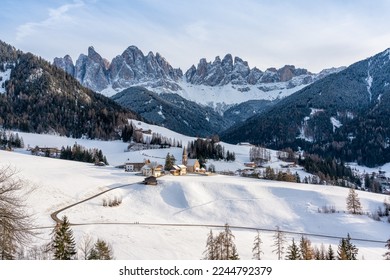Snowy panorama at Santa Magdalena village in the famous Val di Funes. Trentino Alto Adige, Italy.