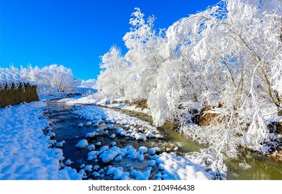 Snowy River In Winter Landscape