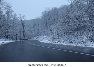 Snowy Road near the forest, winter background - Powered by Shutterstock