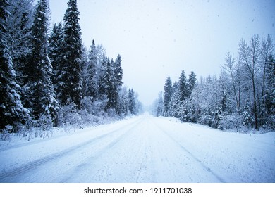 snowy road with no one around