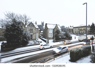 Snowy Road On A Cold Morning In The North Of England. Heavy Snowfall And Winter Town Scape In Huddersfield Town, West Yorkshire, UK