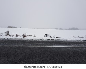 It's A Snowy Road Side.