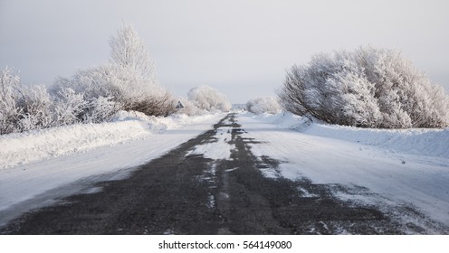 Snowy Road In The Winter.