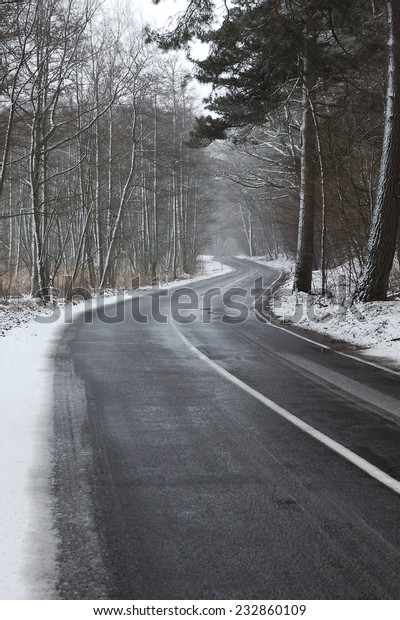 Snowy road in winter\
landscape