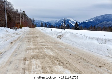 Snowy Road And Winter Landscape With Snow Covered Mountains And 46er High Peaks Popular For Hiking And Climbing, Adirondacks New York