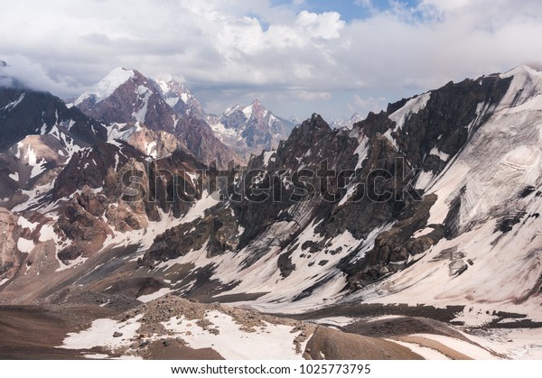 Snowy Rocky Mountain Landscape On Cloudy Stock Photo Edit Now