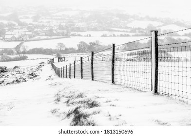 Snowy Rolling Dorset Hills Looking Down Towards Corfe Castle.