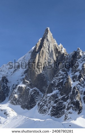 Snowy sharp mountain peaks of the French Alps in winter