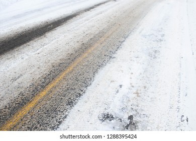 Snowy And Slushy Road Viewed From The Side