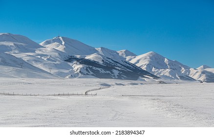 Snowy view of Palandoken mountain range. Panoramic view of Palandöken mountains, world famous ski slopes in Erzurum, Turkey. - Shutterstock ID 2183894347