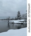 Snowy waterfront lake in Muskoka winter 