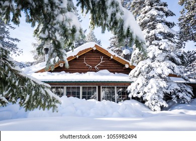 Snowy Winter Cabin In The Woods Trees