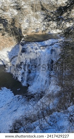 snowy winter frigid waterfall background