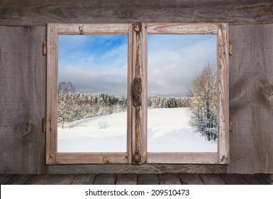 Snowy Winter Landscape. View Out Of An Old Rustic Wooden Window.