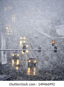 Snowy Winter Road With Cars Driving On Roadway In Snow Storm