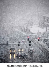 Snowy Winter Road With Cars Driving On Roadway In Snow Storm