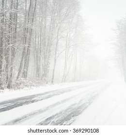 Snowy Winter Road During Blizzard In Latvia. Heavy Snow Storm.