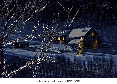 Snowy Winter Scene Of A Cabin In Distance At Night