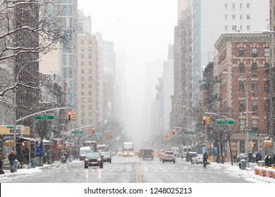 Snowy Winter Street Scene Looking Down 3rd Avenue In The East Village Of Manhattan During A Nor’easter Snowstorm In New York City