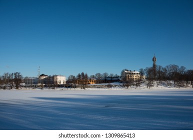 Snowy Winter View In Stockholm, Teletower, The Meadow Gärdet And The Park Djurgården