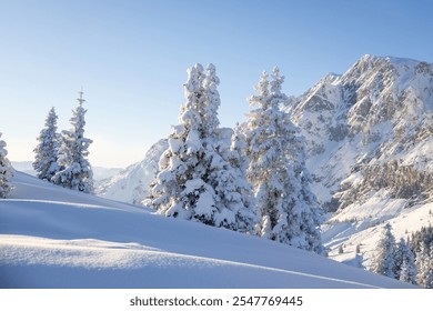 Snowy wintertime landscape and high iconic mountain peaks. Austrian Alps - Powered by Shutterstock