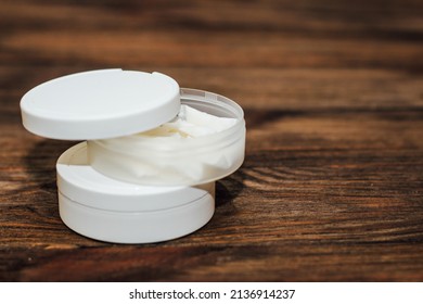 Snus Box With Nicotine Pouches On Wooden Background.